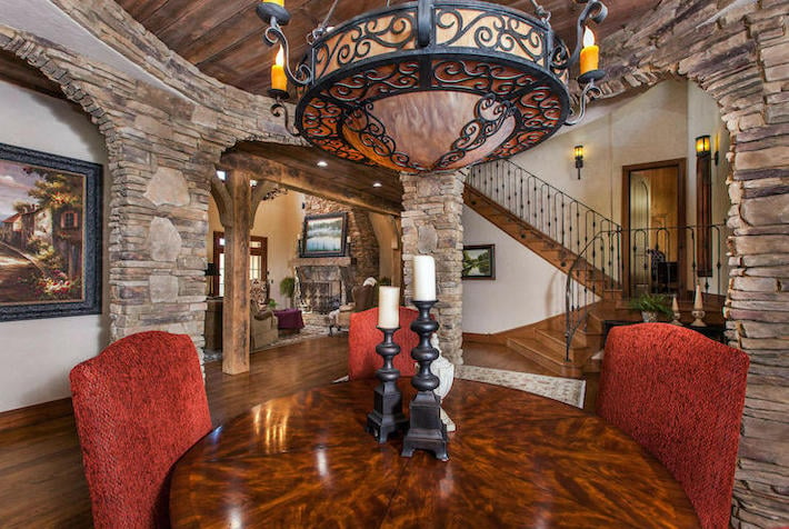 dining room surrounded by stone