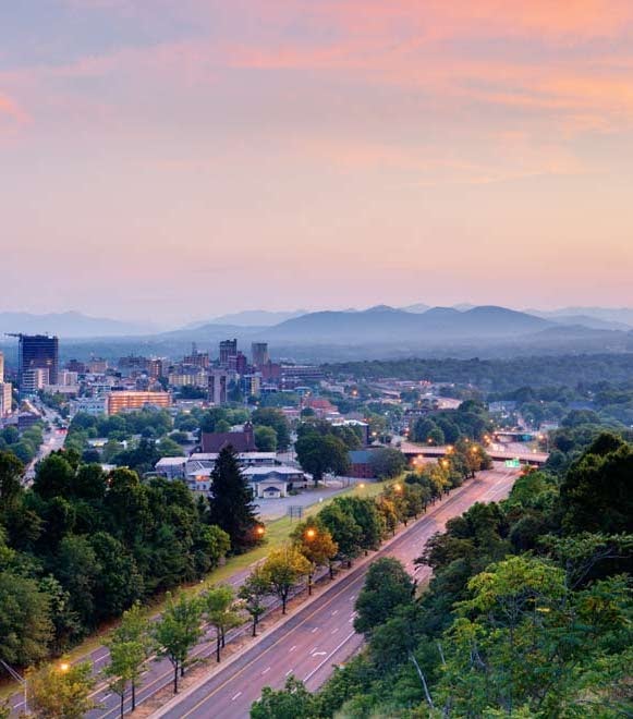 road through Asheville at sunset