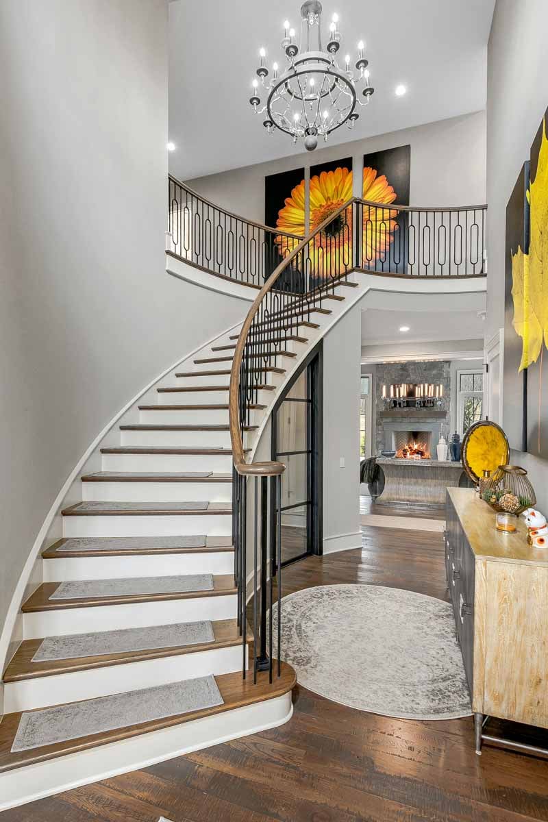 grand staircase of 64 Walnut Valley Parkway Arden home