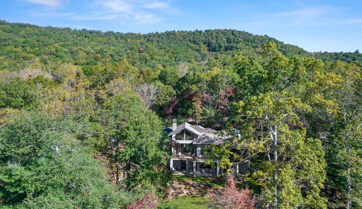 luxury mountain home tucked into forest